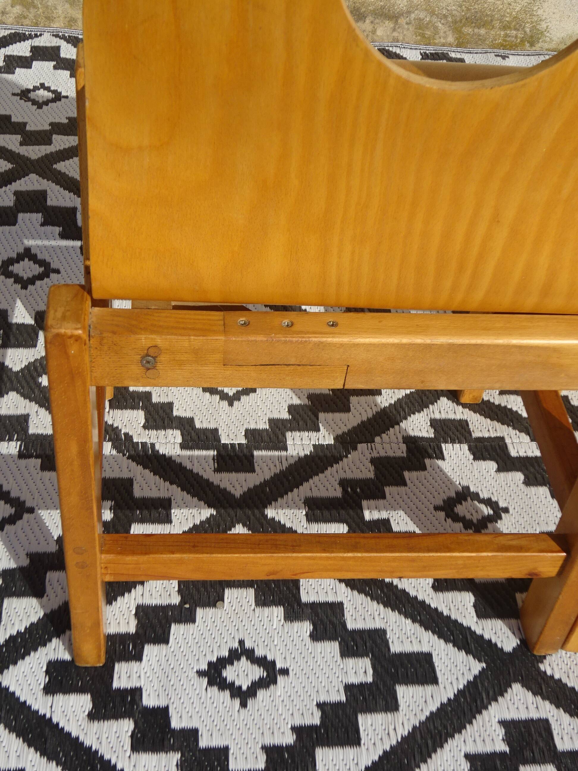 Pair of light wood chairs with post-formed seat and backrest.