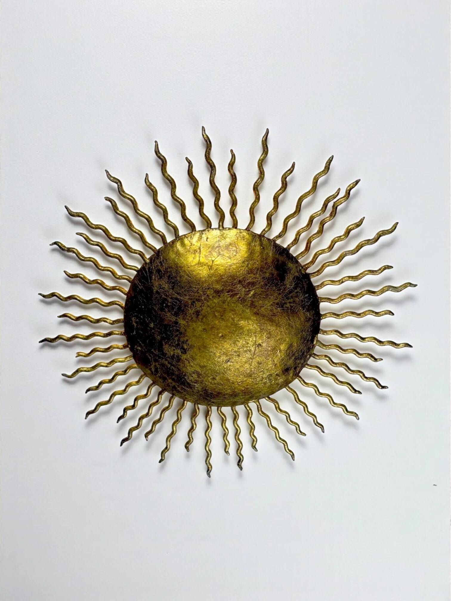 French gilt metal sunburst light fixture, Gilbert Poillerat, 1930s France
