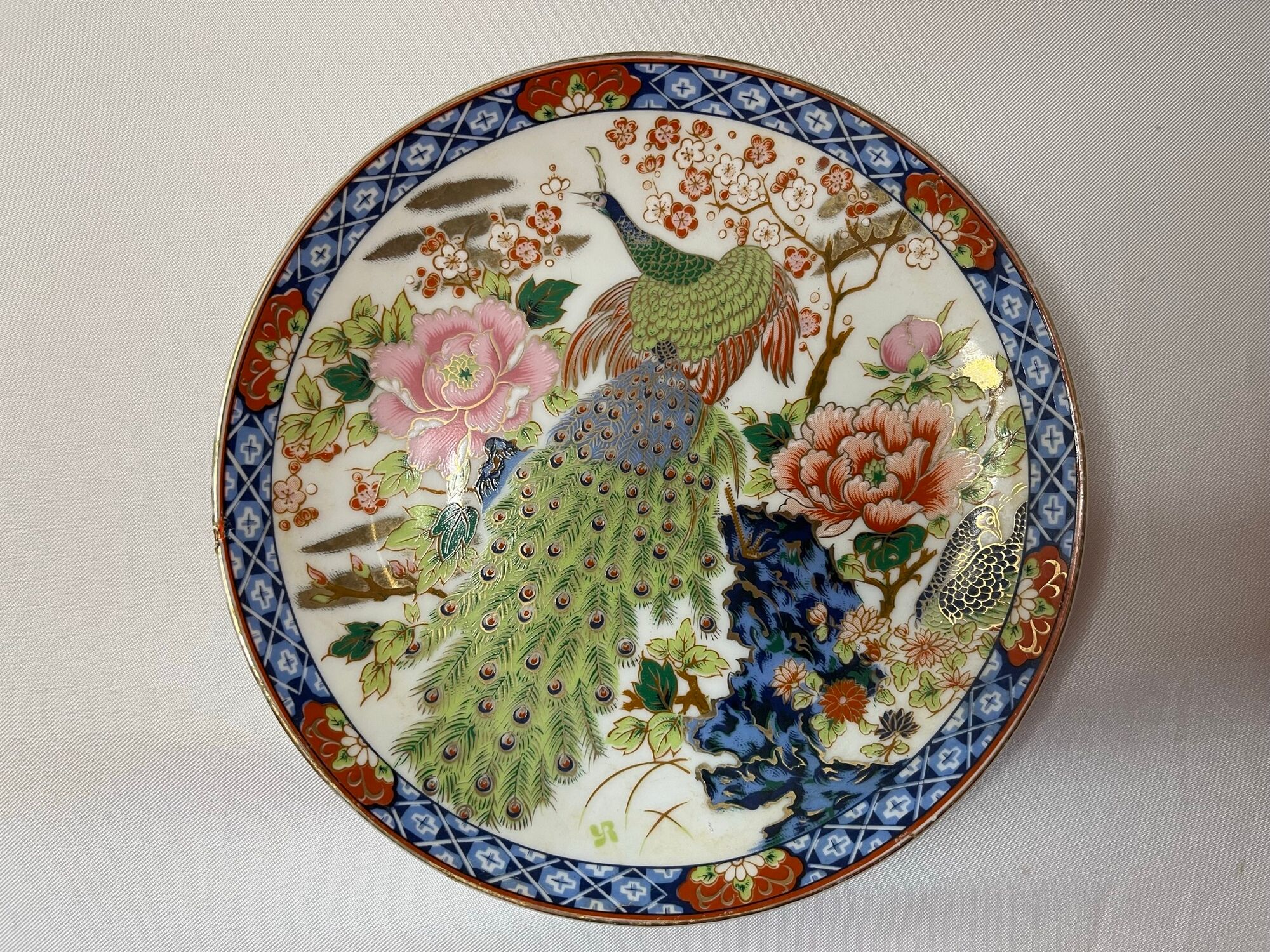 Set of 4 porcelain plates decoration peacock Japan XXth