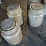 Lot of seven sandstone spice pots