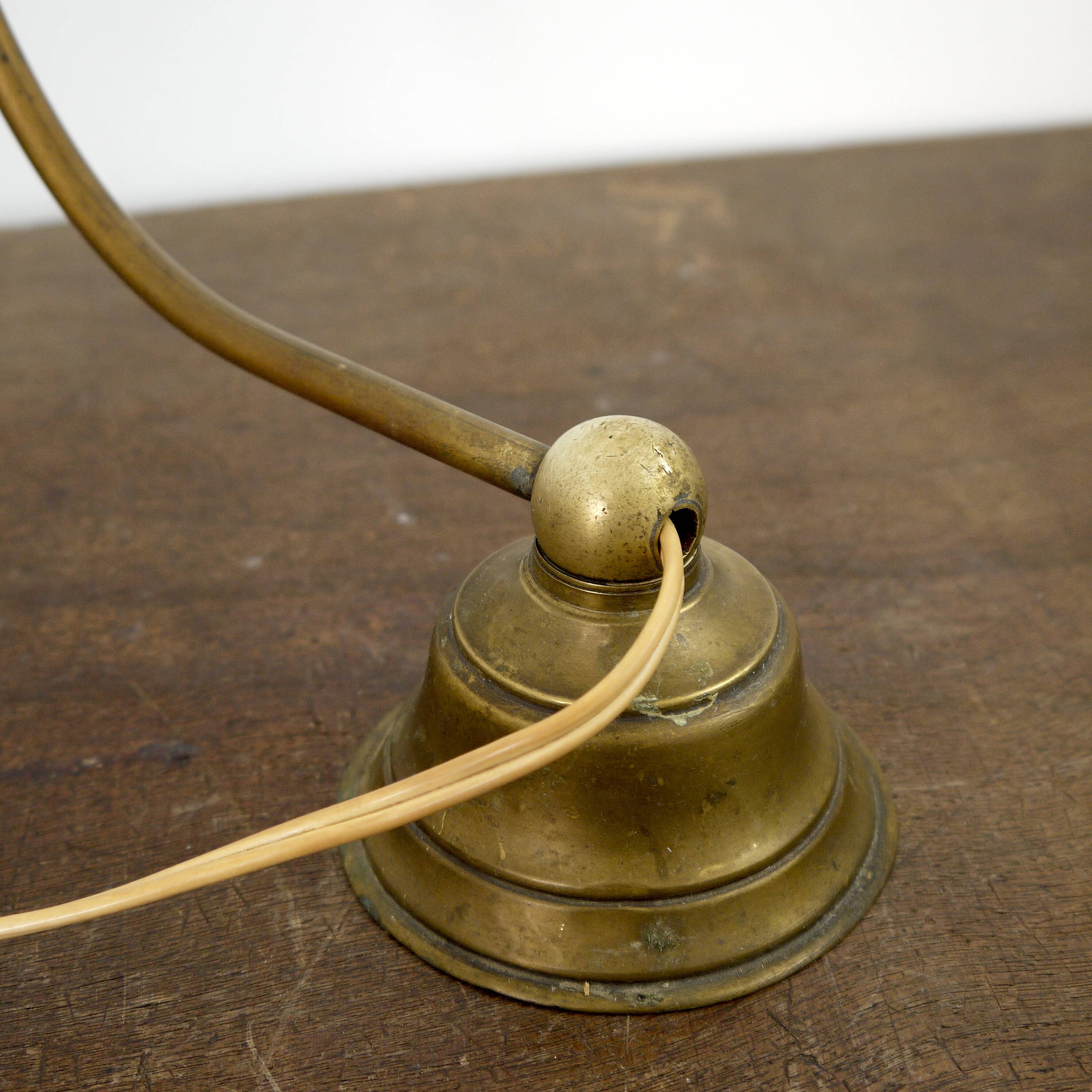 Brass lamp with glass globe