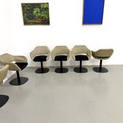 Series of six swivel chairs with organic shell, mottled fabric and base dis