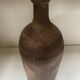 Old sandstone bottle