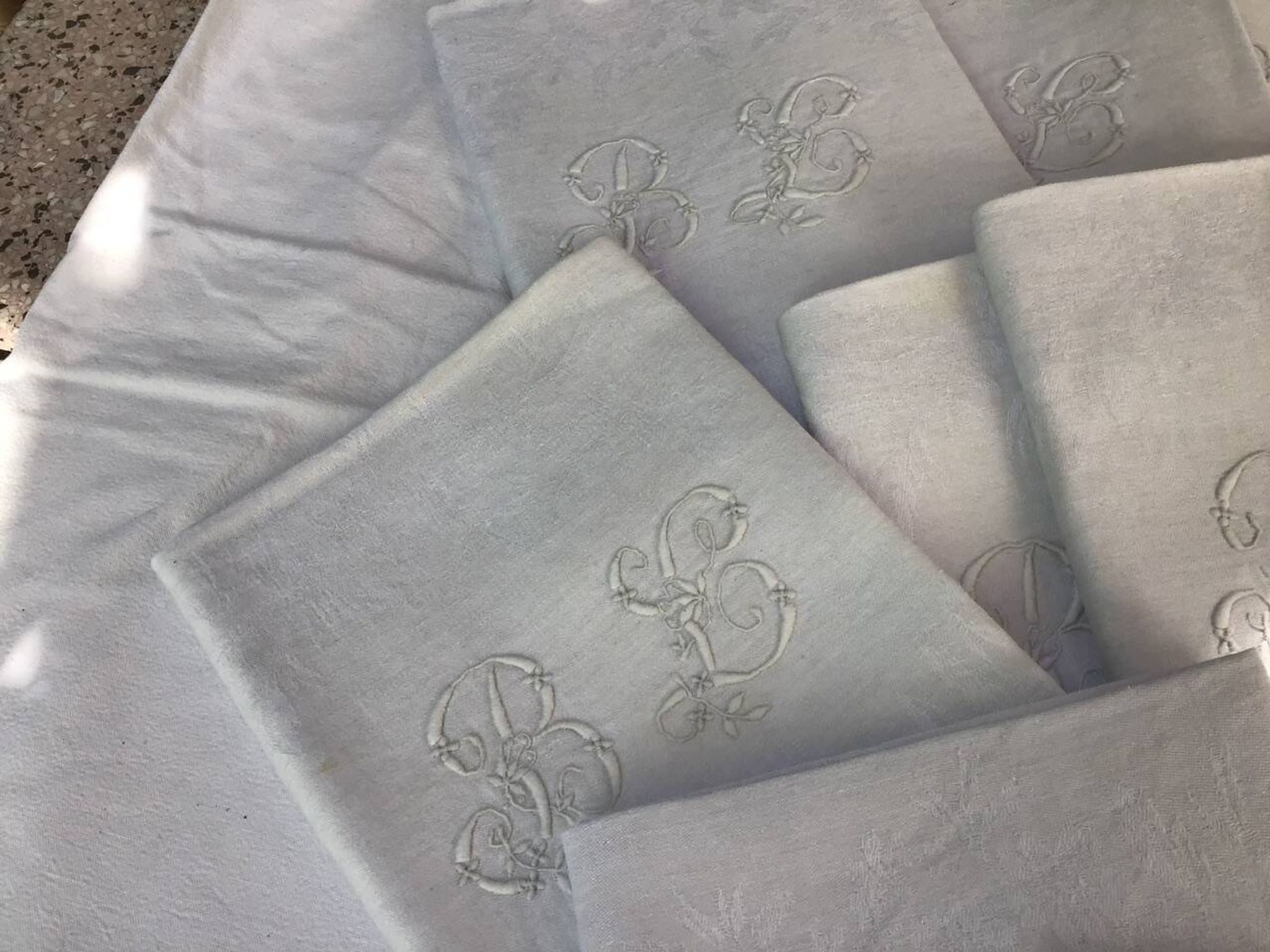 Set of 12 19th century white napkins marked “BL”