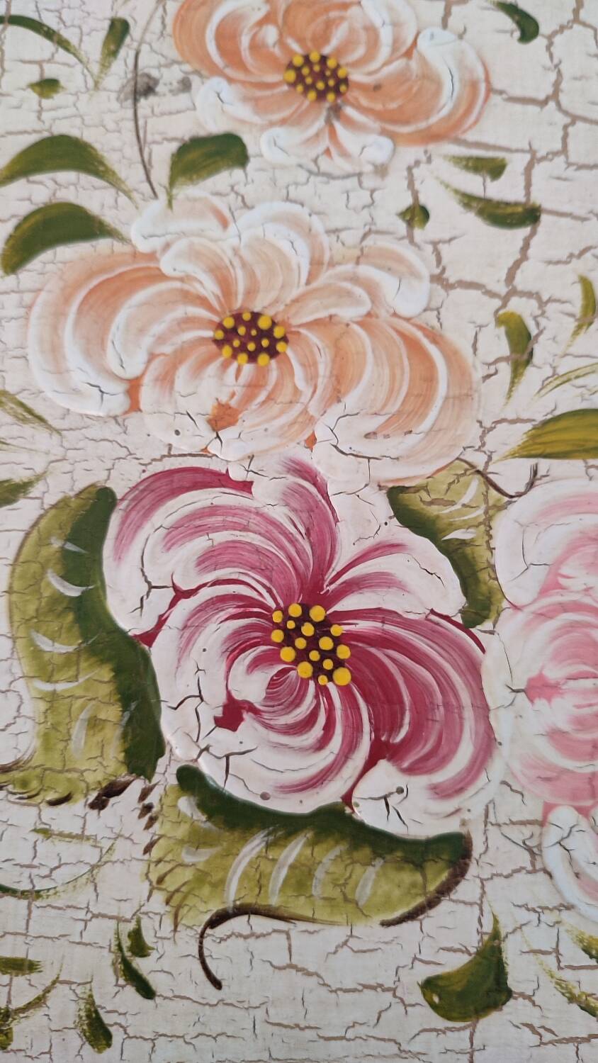 Painted chest of drawers with floral decoration