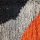 Large handmade Moroccan rug with colourful patterns.