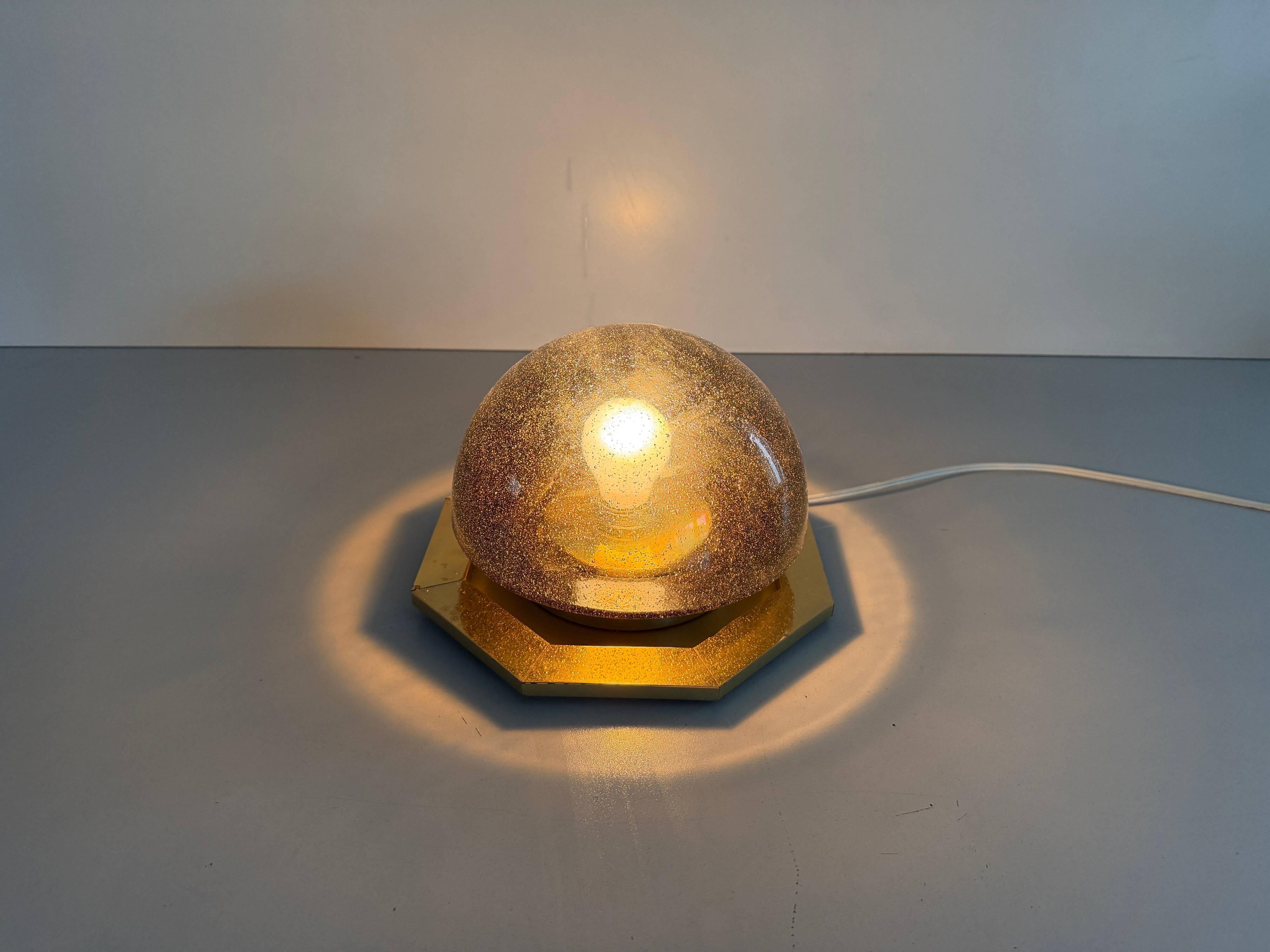 Octagonal ceiling light in brown glass and brass base by Limburg, 1960s, Germany.