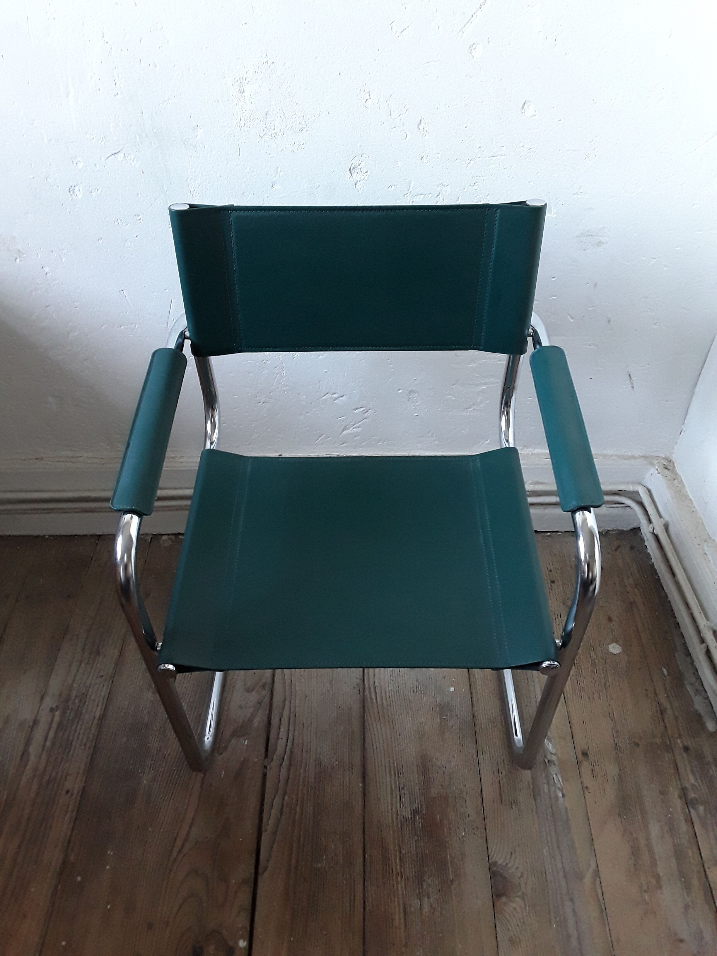 Fauteuil chrome et cuir année 70