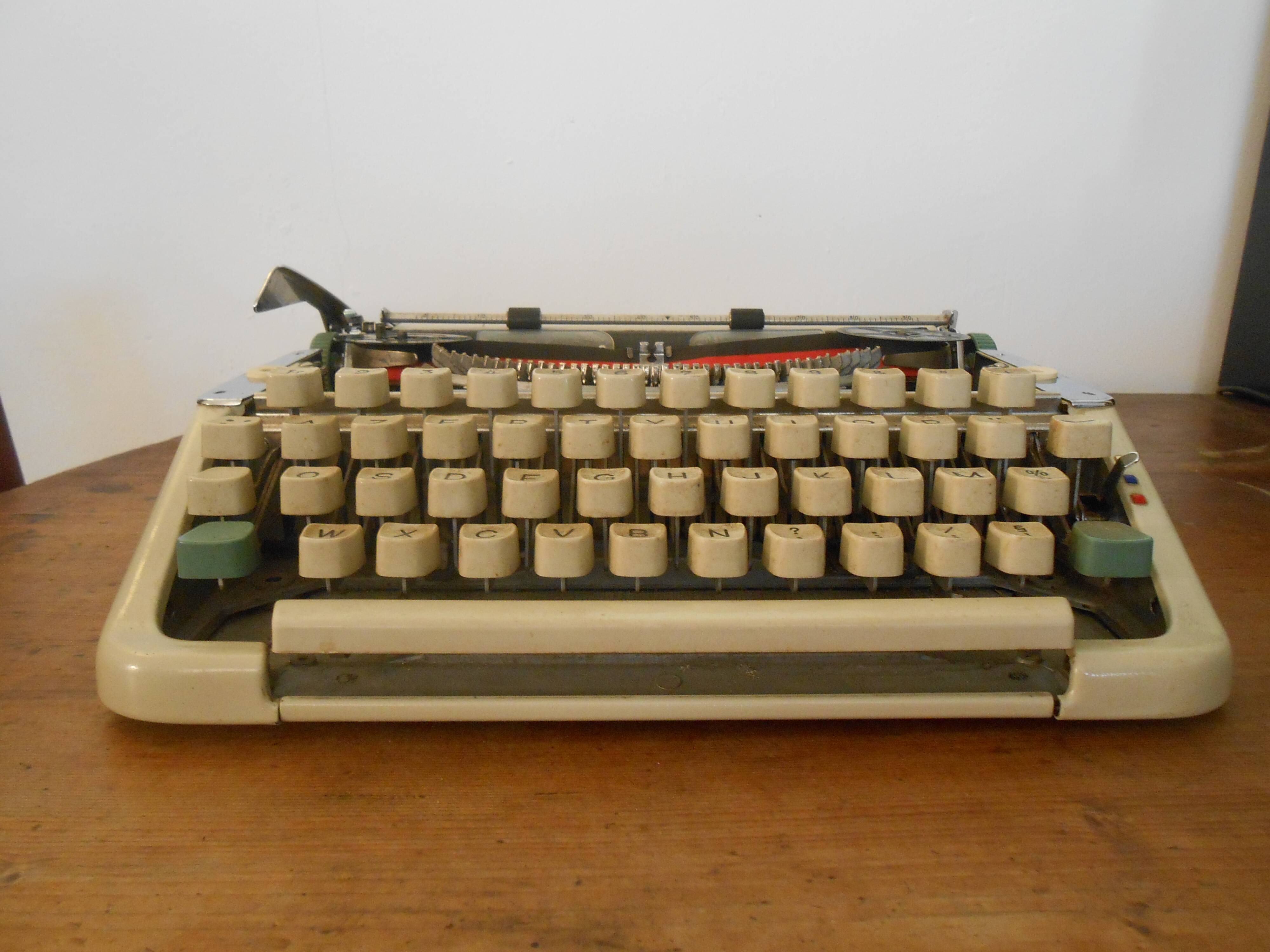 Typewriter Olympia 66, with cover