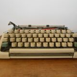 Typewriter Olympia 66, with cover