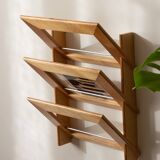 Wall-mounted magazine rack in varnished plywood, 80s/90s
