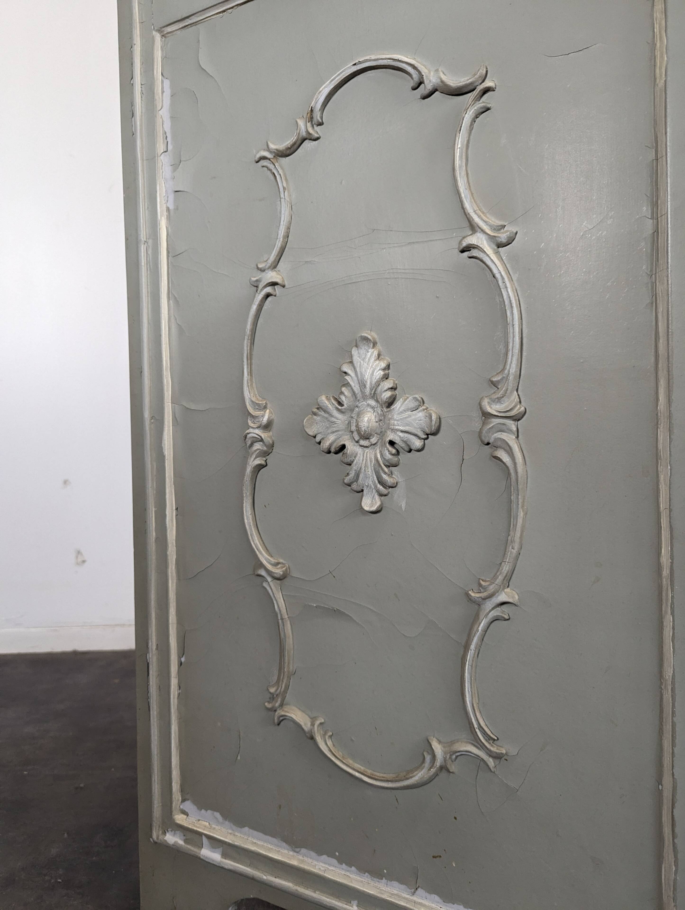 Louis XVI style caned screen with a re-champis finish.