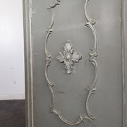 Louis XVI style caned screen with a re-champis finish.