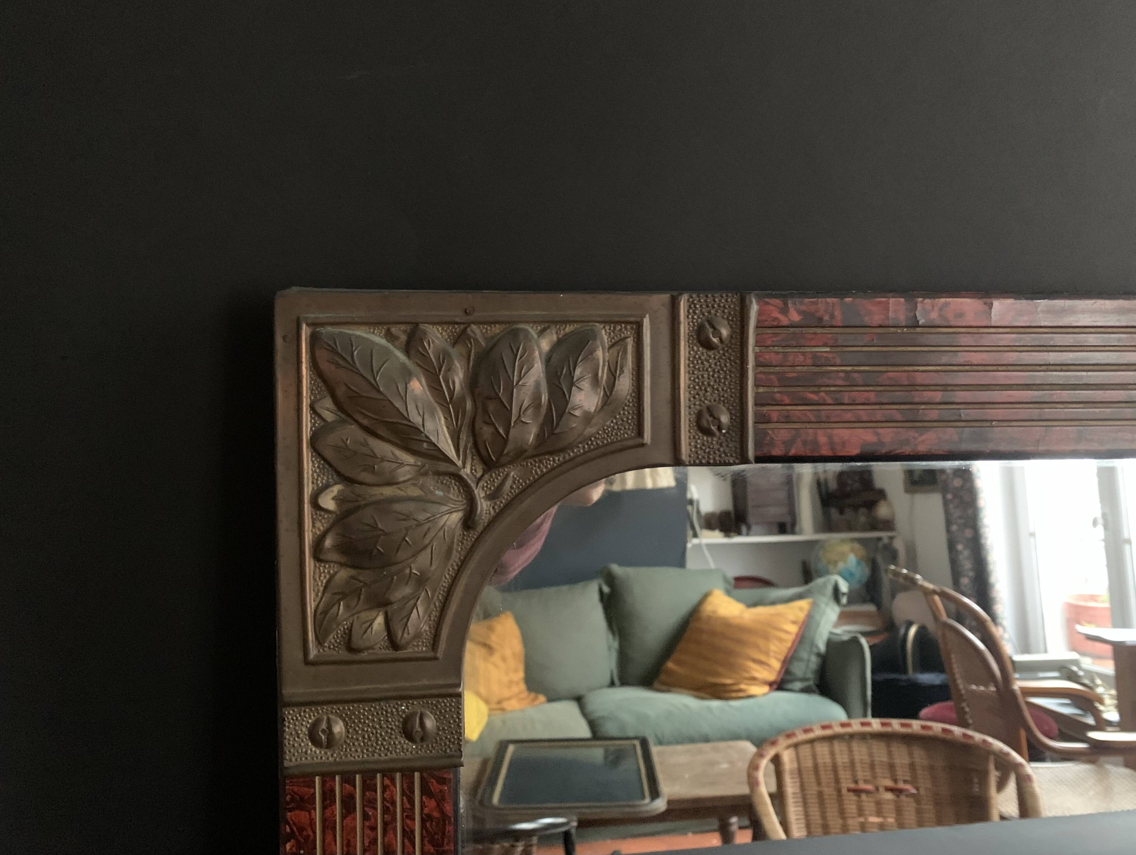 Hand painted art nouveau mirror decorated with chiseled brass, french mercury mirror from the 1920s