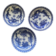 Asian porcelain plates decorated with blue dragons