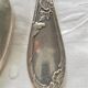 8 teaspoons made of silver metal