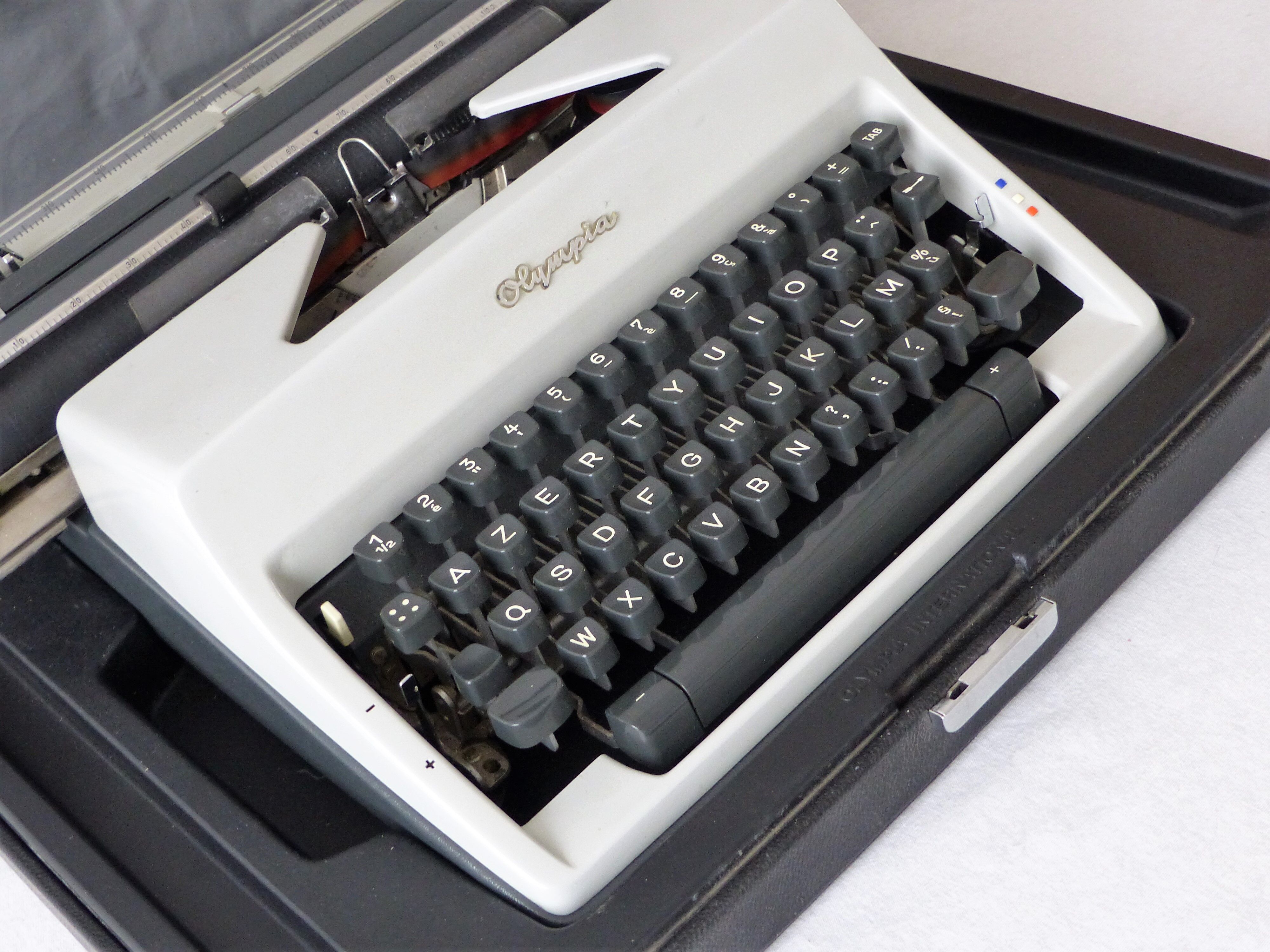 Olympia typewriter in his suitcase