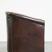 luxury dark leather club chair with English-style ball feet