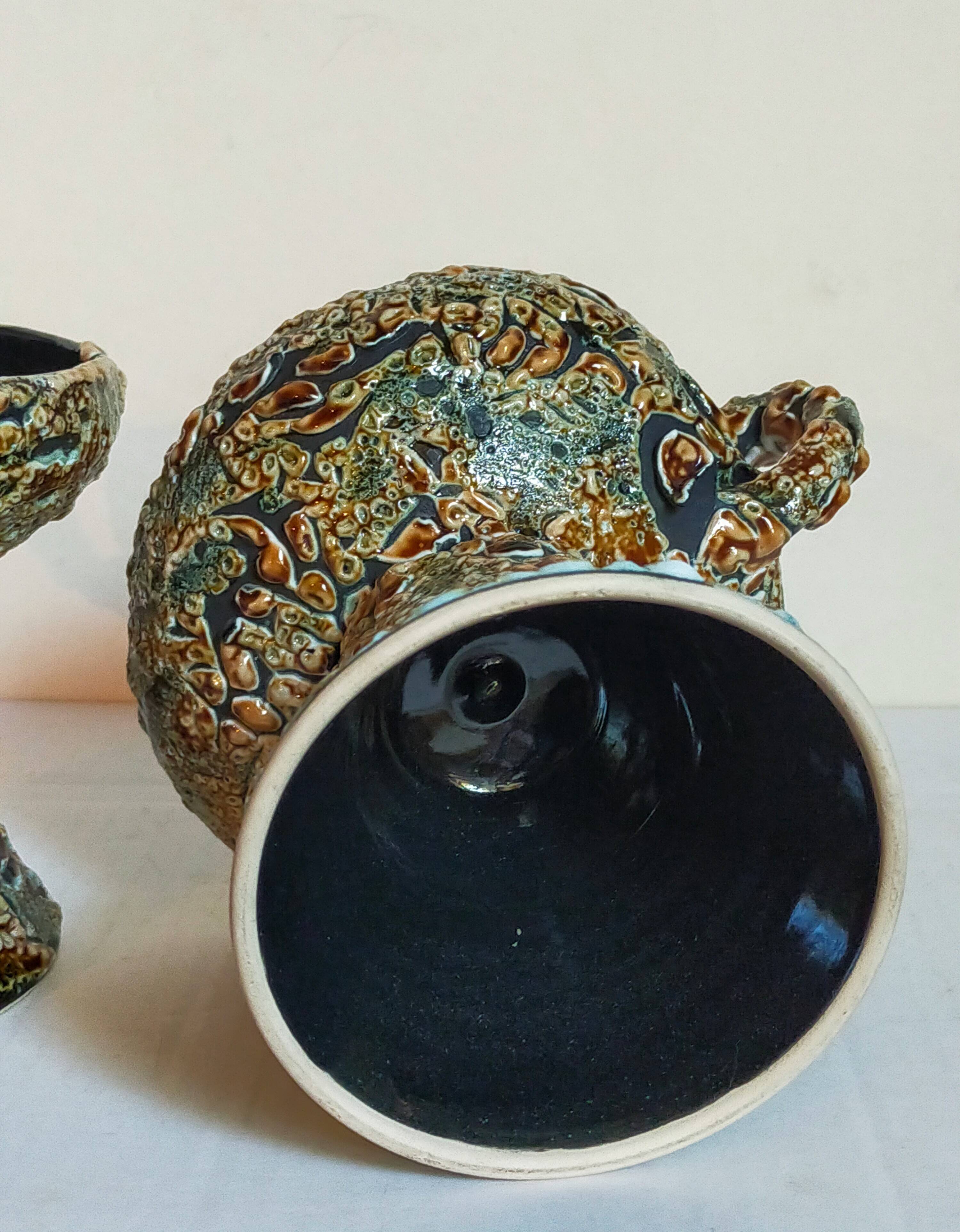 Pair of vintage Vanoise honey foam ceramic candlesticks