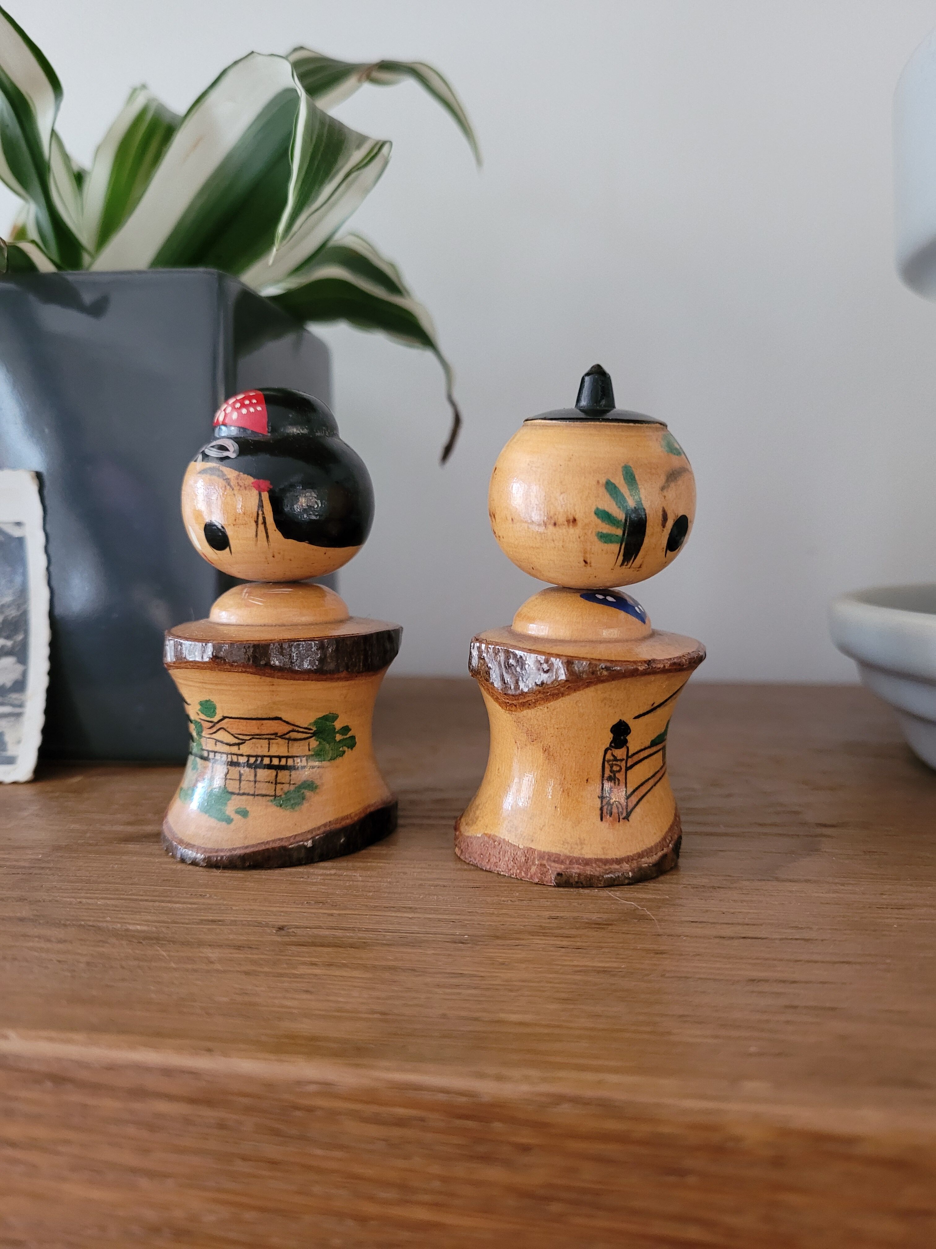 Two Kokeshi dolls