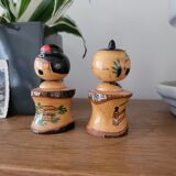 Two Kokeshi dolls
