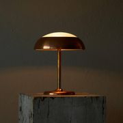 Art Deco table lamp in patinated copper, brass, and satin glass from the 1950s.
