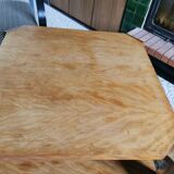 Square art deco coffee table in light wood