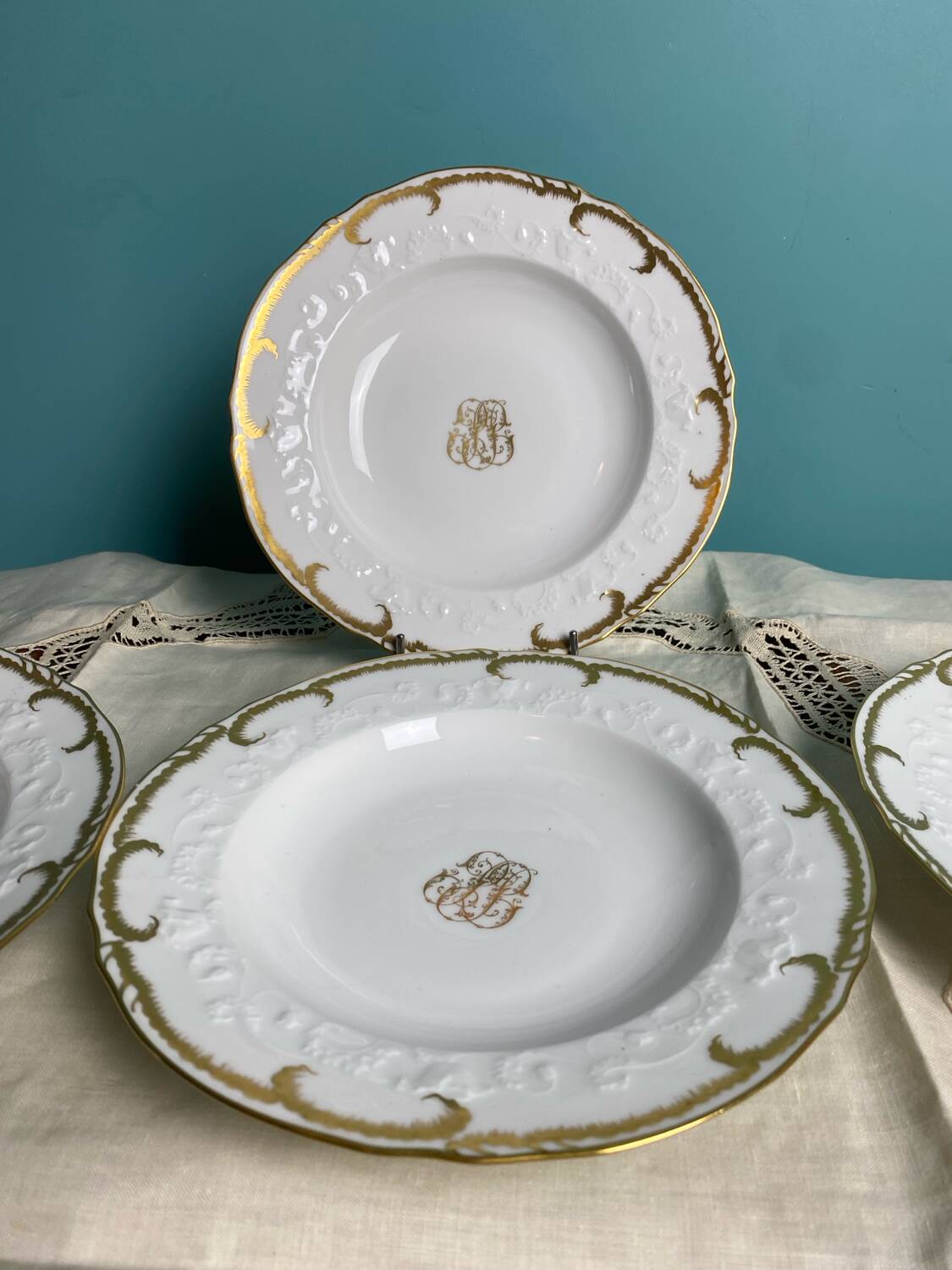 4 deep plates from Limoges with the PJC gold monogram.