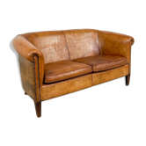 Vintage hand colored sheep leather two seater club sofa