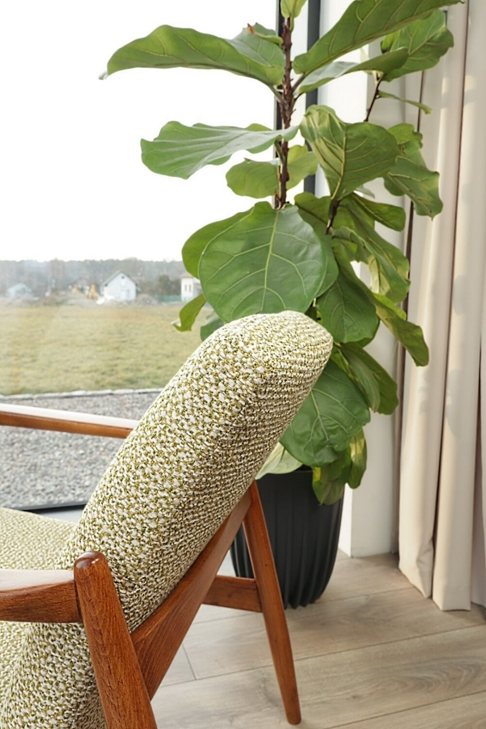 Vintage armchair with a green nebula design by E. Homa, 1970.