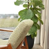 Vintage armchair with a green nebula design by E. Homa, 1970.