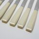 Household box of 12 vintage stainless steel knives and unbreakable resin