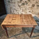 Vintage French pine table with extendable side, circa 1930, suitable for kitchen or office use.