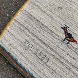 Persian Gabbeh rug with playful patterns 240x170
