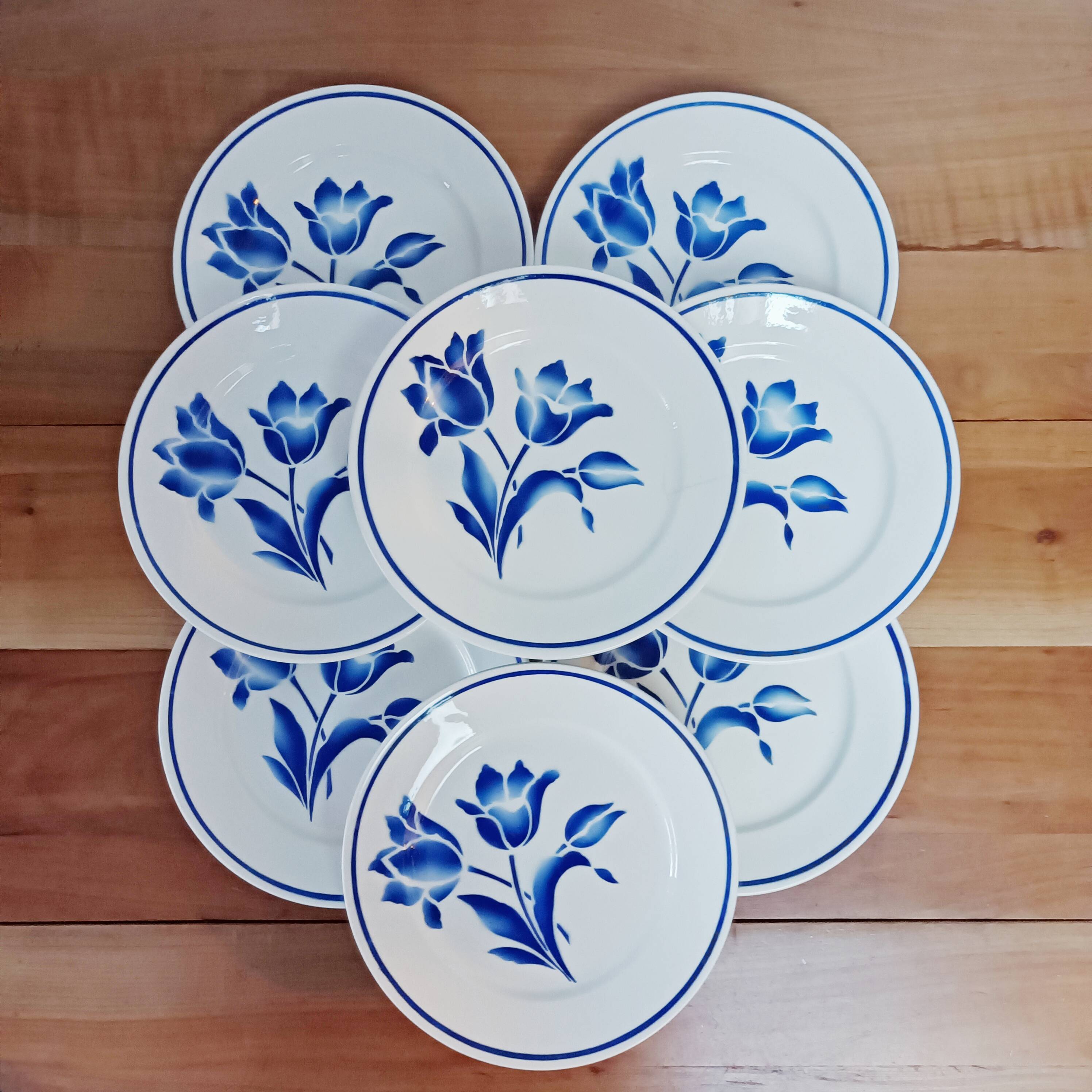 Lot de 8 assiettes plates Badonviller, Brétigny, fleurs bleues