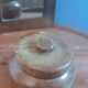 Old salt pot in sandstone, with lid