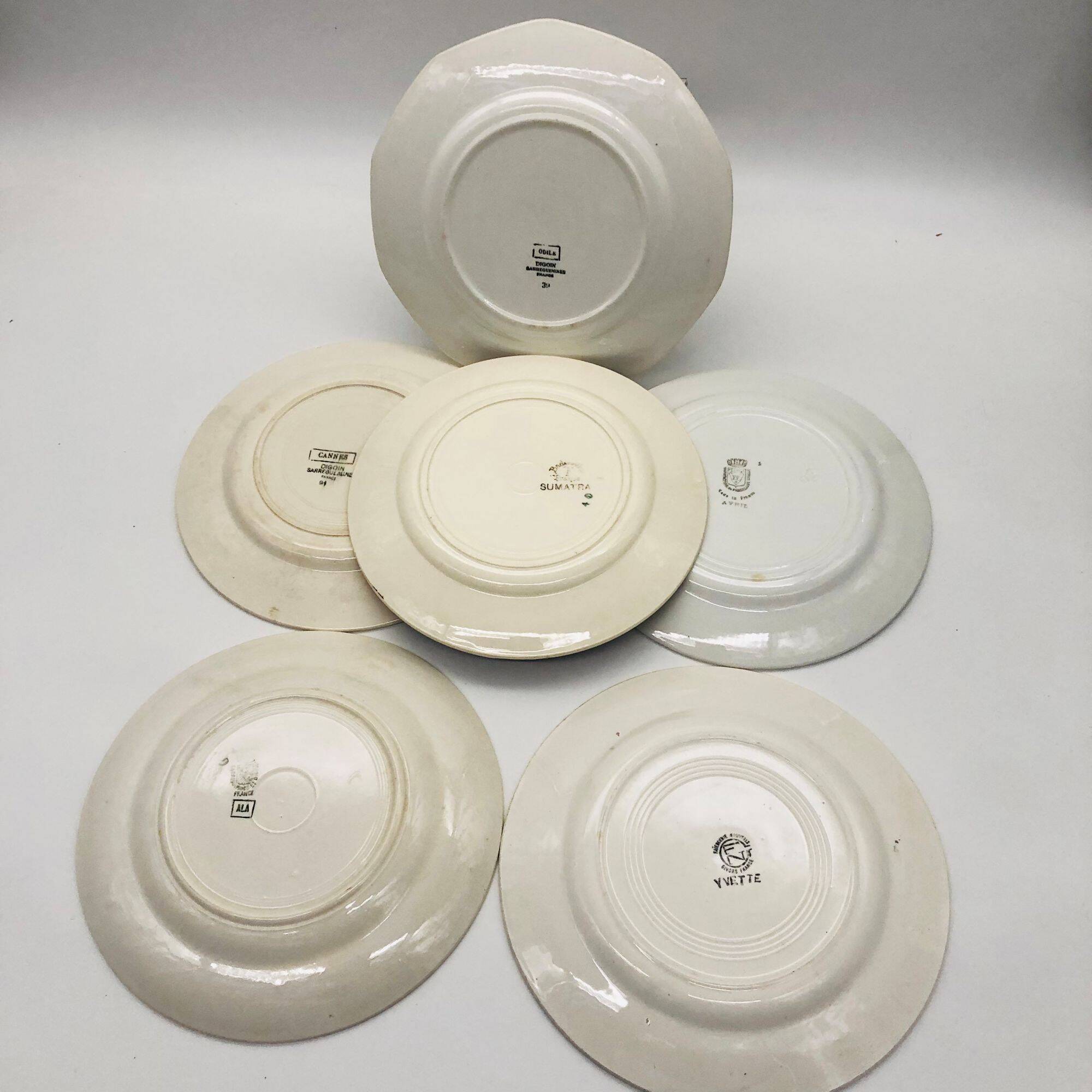 Set of 6 mismatched flat plates.
