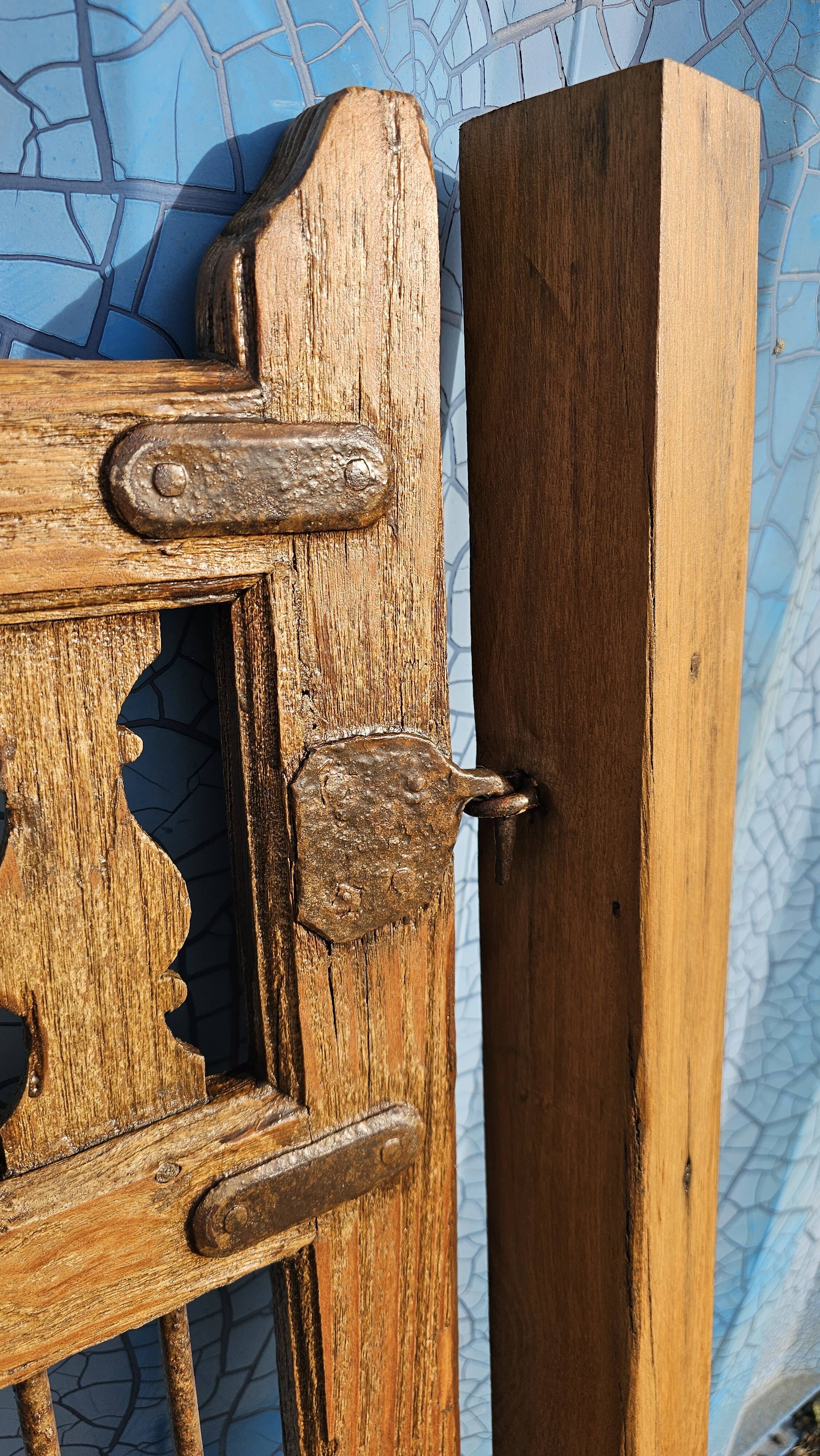 Old garden gate in solid teak