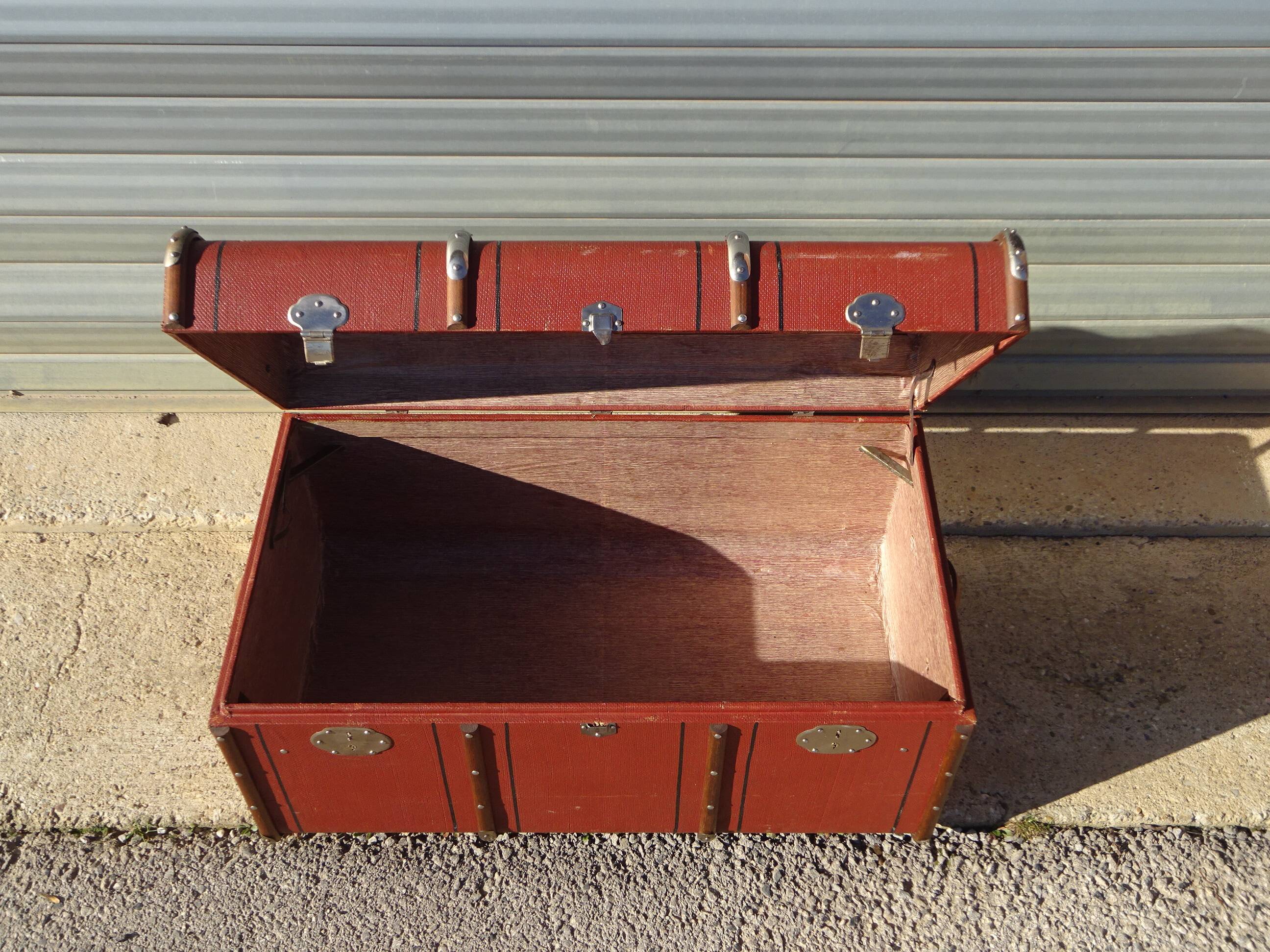 Old curved travel trunk