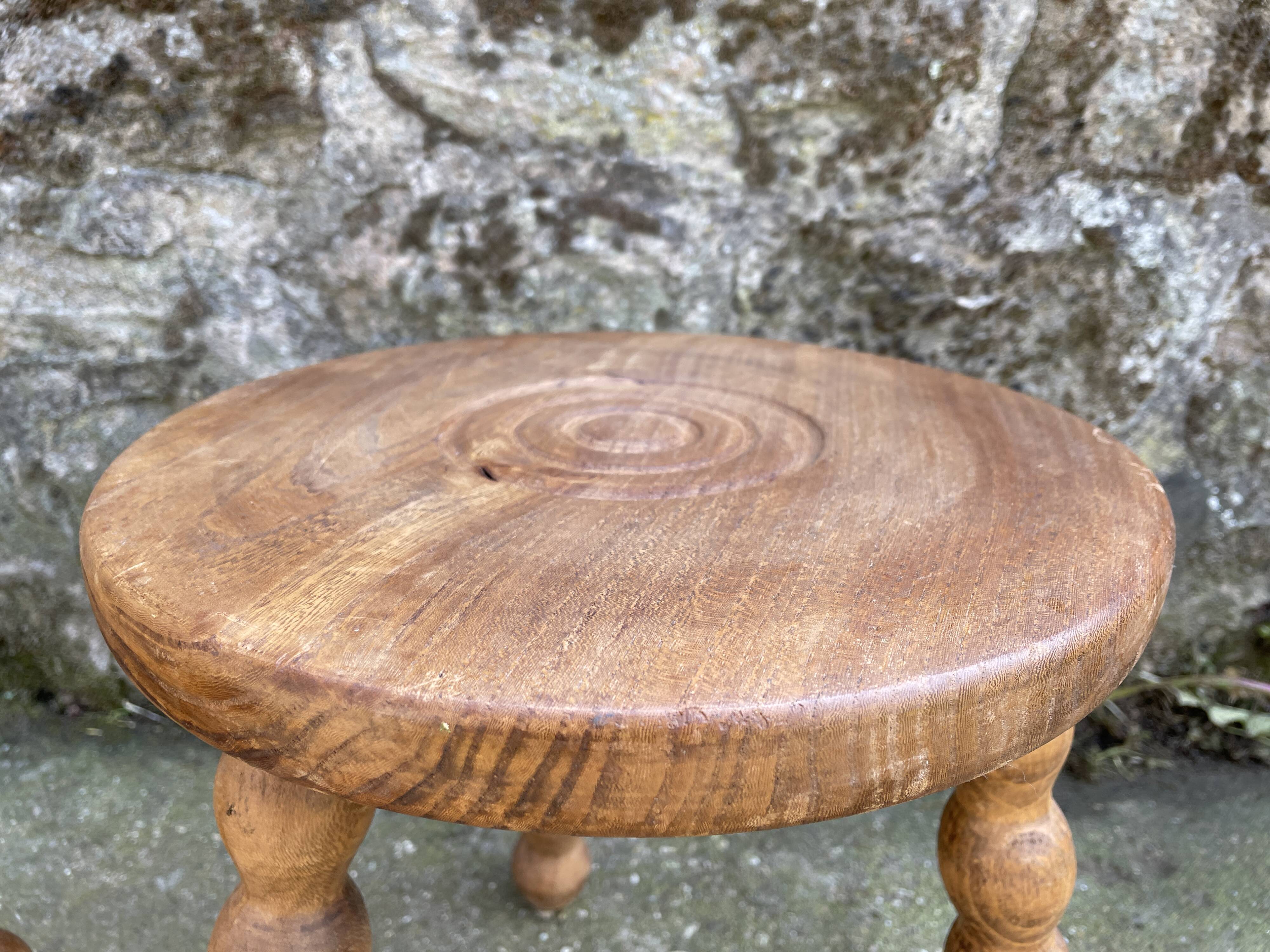 Set of two tripod Breton stools
