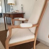 Renovated Voltaire armchair with boucle fabric.