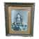 Framed portrait of a young girl.
