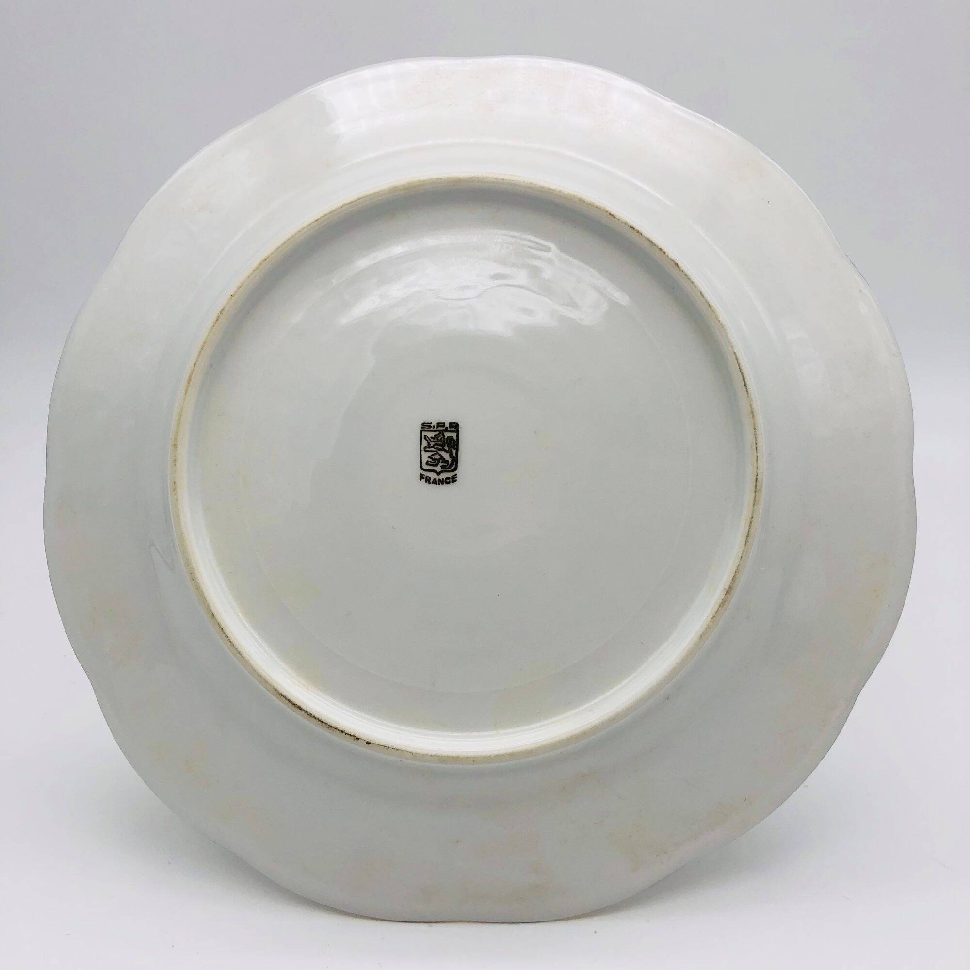 6 flat plates. In S.F.P. Limoges porcelain.