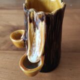 Ceramic vase with tree trunk decoration