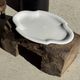 Antique oval-shaped white crackled faience plate with a scalloped edge.