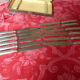 Series of 12 antique silver metal knives in their box