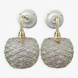 Pair of chiseled glass wall sconces