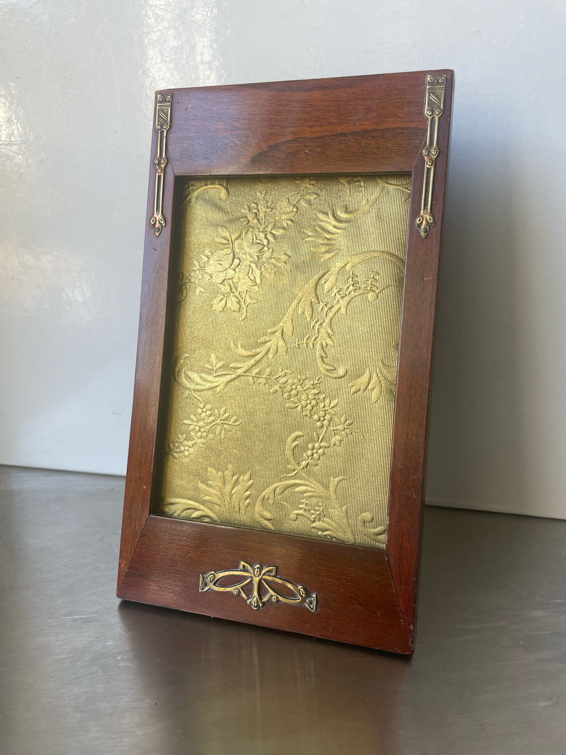 Mahogony and gilded brass picture frame