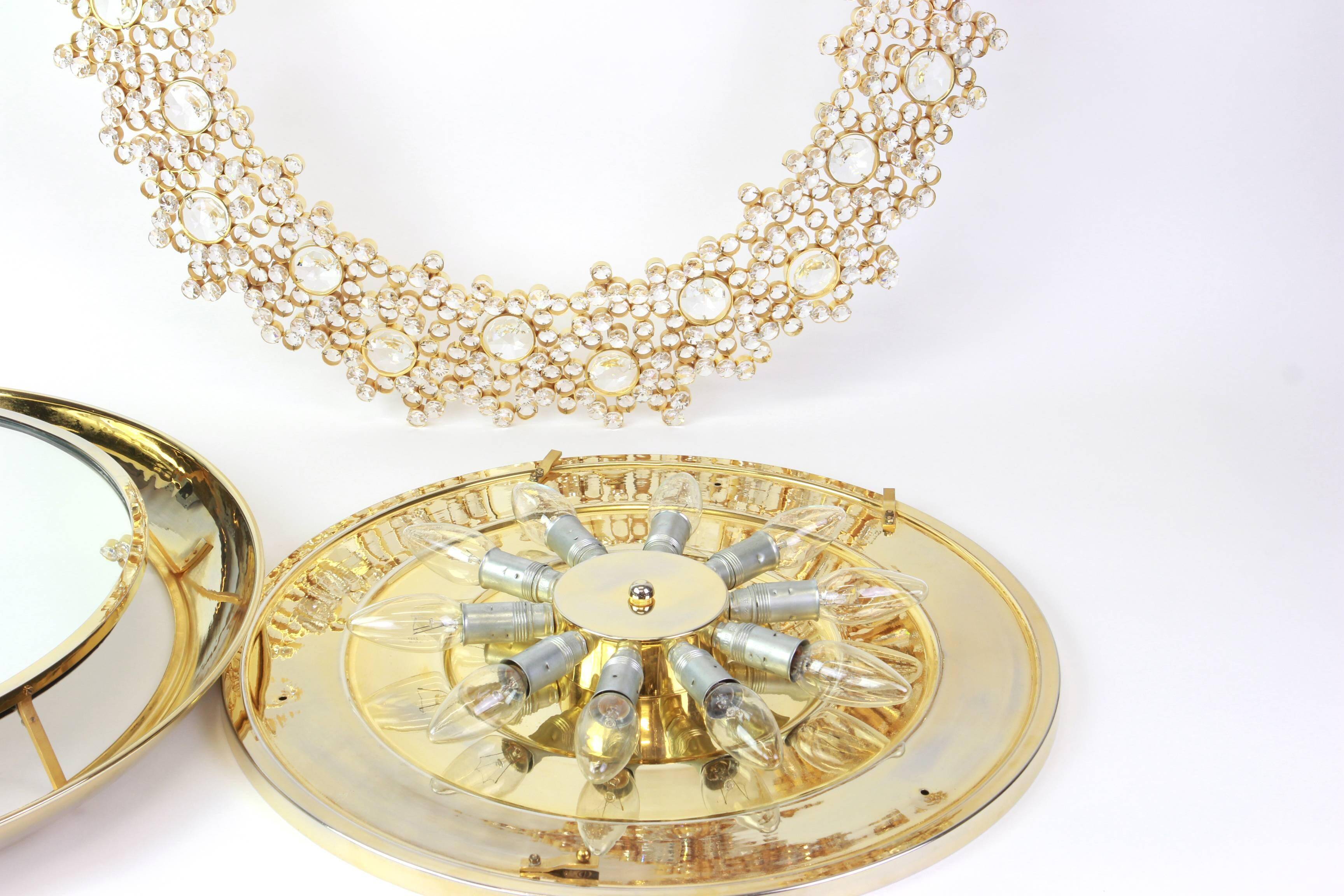 Spectacular backlit mirror in gilded brass and crystal glass by Palwa, Germany.