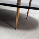 Oval coffee table black glass and vintage 1960 vintage gilded brass feet
